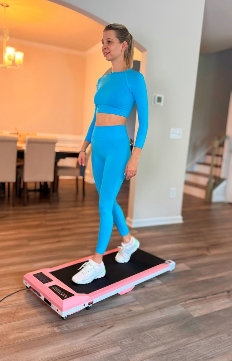 WELLFIT WP009 Home scene using pink walking mat treadmill